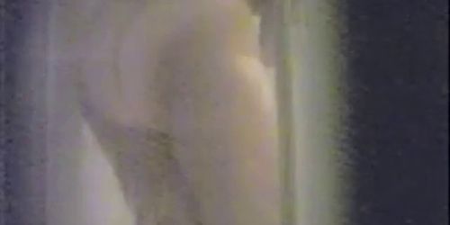 Plump woman masturbate in the shower.