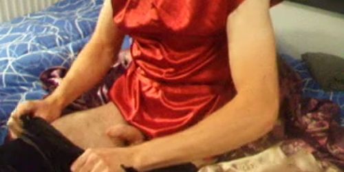 Cumming over red satin top