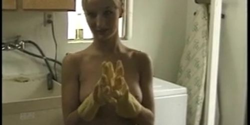 Blonde gets oil and gives guy hard handjob