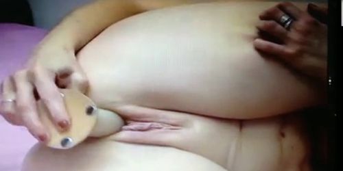 MILF with big tits makes her pussy sguirt with a dildo