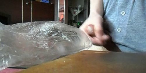 Jerking off into a plastic bag