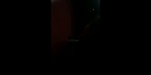 Sucking dick at a gloryhole