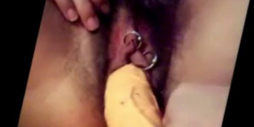 Pierced hairy pussy stuffed with big dildo