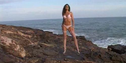 Tall girl in pink undies on the rocks  FM14