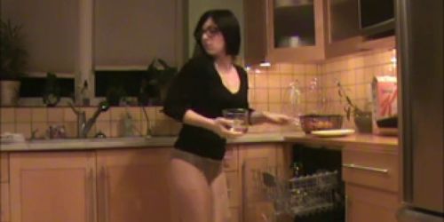 in pantyhose in the kitchen