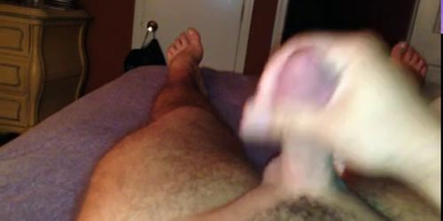 Stroking cock and cumshot