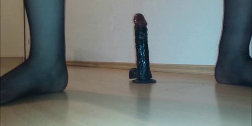 Transsexual rides a big dildo until