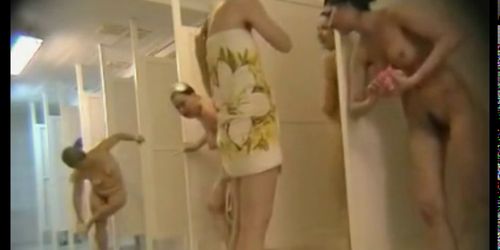 group naked females caught in public shower room