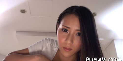 Japanese hottie wets her pussy