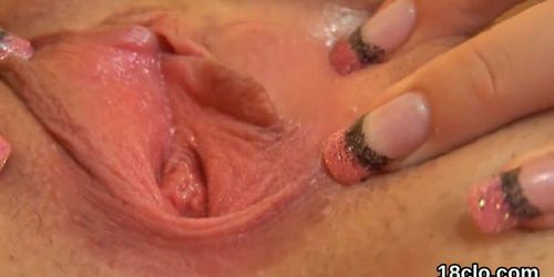 Sultry girl is gaping pink twat in closeup and cumming