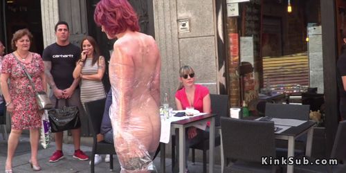 Babe wrapped in plastic in public