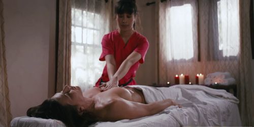 Asian masseuse enjoys licking her busty clients wet pus