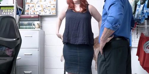 Busty redhead MILF shoplifter Amber Dawn spreads her pu