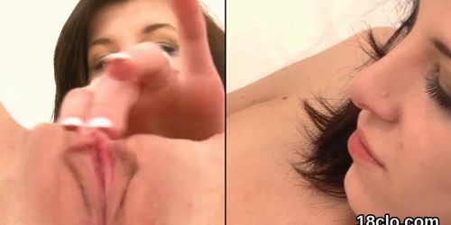 Erotic cutie is gaping pink twat in close range and com