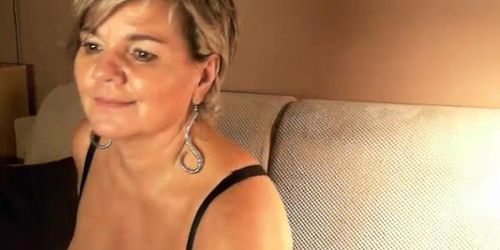 short haired german mature with big tits on her webcam