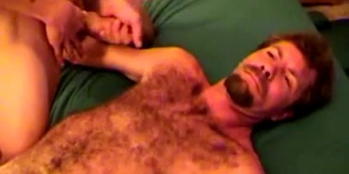 Mature bear tugging on his hard cock