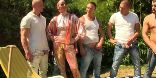 Glam Simony Diamond gags on nine cocks outdoors