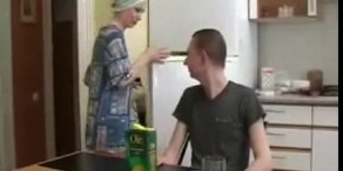 Russian Lady And Boy In Kitchen 1