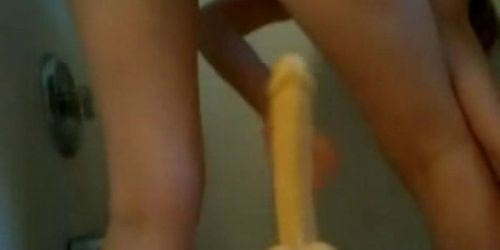 Teenage girl with dildo.