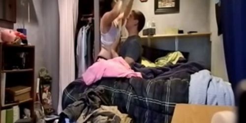 Homemade Young Couple In Messy Room