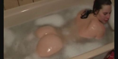 Immature Houseviwe Plays in a Bath