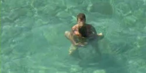 Couple having sex in the sea