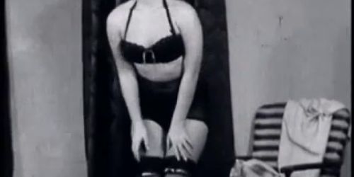 Vintage Blond women in a black bra