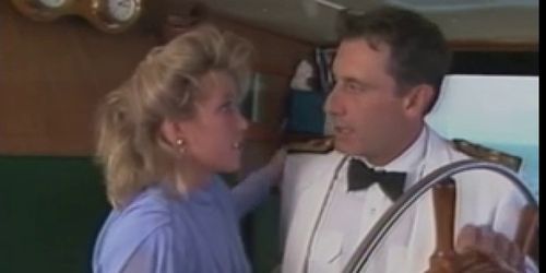 Candy Evans and John Leslie on a boat....