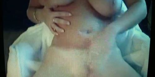 Girl rubbing tits and pussy on cam