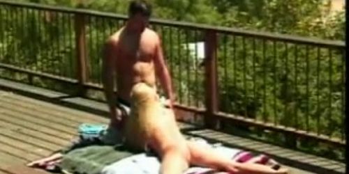 Sexy blonde teen gets seduced on cabin deck in the moun