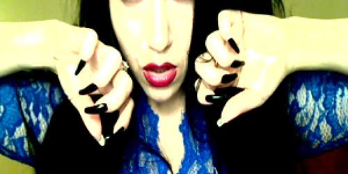 seductress with long dark nails