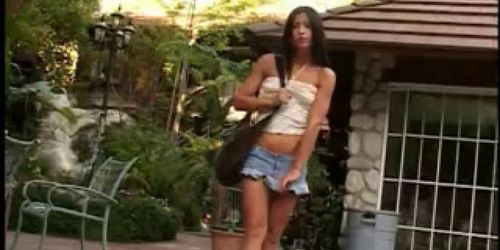 Brunette bends over patio and finger fucks her sexy ass