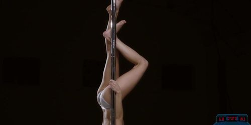 Petite MILF brunette showing off her pole dancing skill