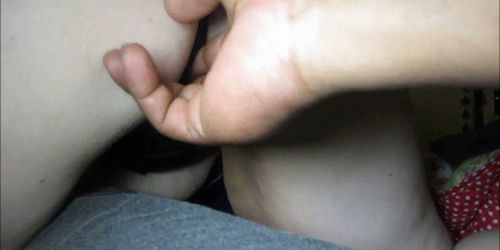 Black hand fingering her holes