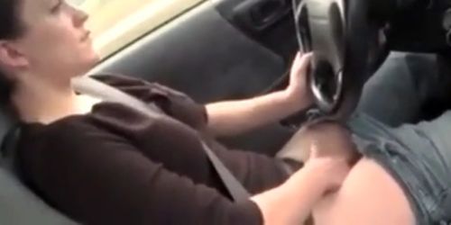 She Fingers Her Pussy While Driving