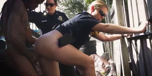 Rebellious MILF cops taking in a massive cock from behi