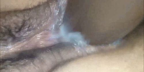 Fucking a creamy vagina with a toy