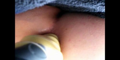 anal dildoing close up