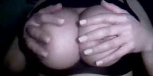 Girl rubbing her bOObs