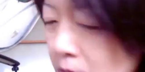 Japanese milf Jerking