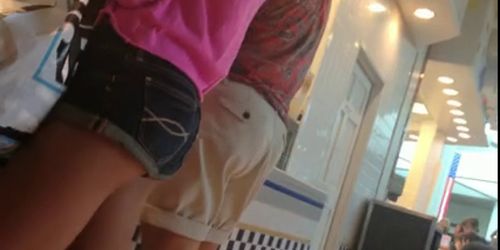 Tight teen wearing shorts in mall