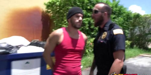 Two cops having HARDCORE gay INTERRACIAL sex in the par