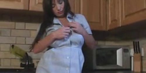 British slut Michelle plays with herself in the kitchen