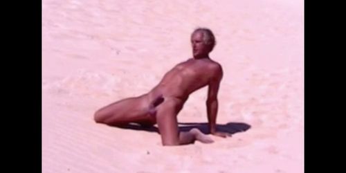 Tanned guy on beach in tiny string thong (temporarily!)