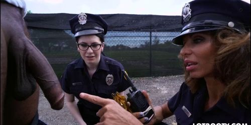 Two big ass female police officers get interracial fuck