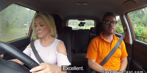 Big ass blonde fucks in driving school