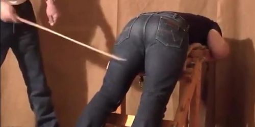 Caned over tight jeans Daddy boy