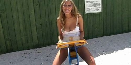 blonde woman unveils her body in front of the cameraman