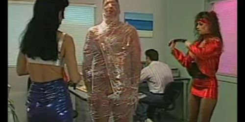 Guy wrapped in saran wrap by sexy chicks