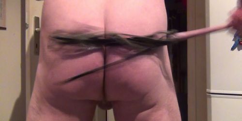 Martinet sur mes fesses